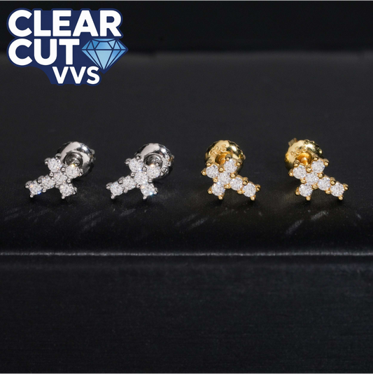 Four pairs of cross-shaped earrings in silver and gold on a black background with 'Clear Cut VVS' logo.