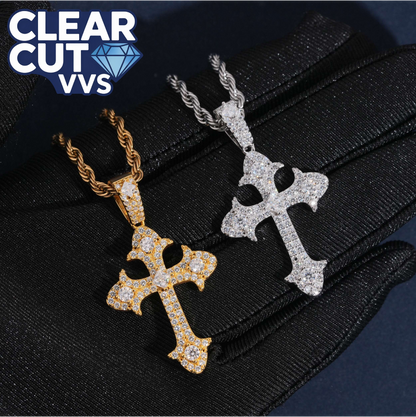 Two diamond-encrusted cross pendants on black gloves with 'Clear Cut VVS' logo.